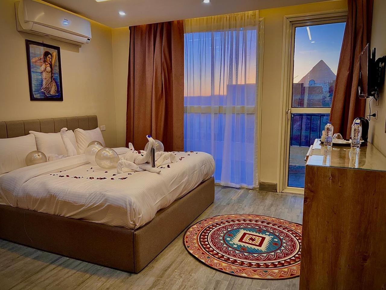 Pyramids Hotel Kafret el-Gabal Екстериор снимка